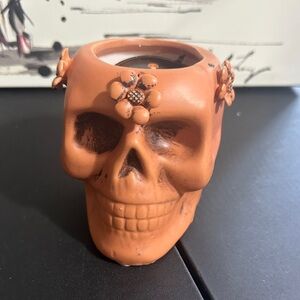 Christian Soriano sparkling cinnamon scented skull candle